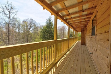 Tucked away among the trees and just minutes from Cave Run Lake - photo 8