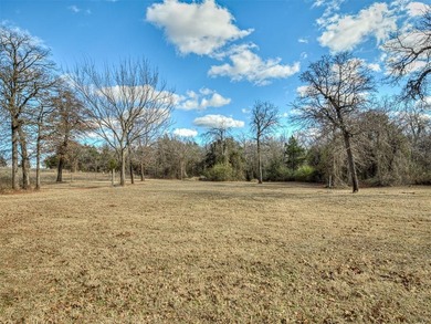 Tucked away on 5 secluded, gated acres, this beautifully crafted