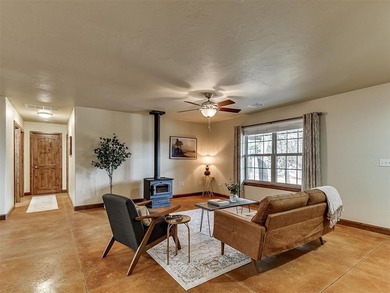 Tucked away on 5 secluded, gated acres, this beautifully crafted