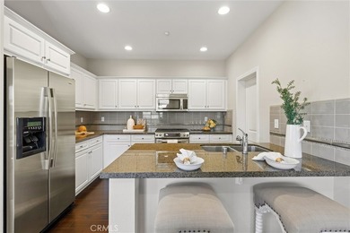 Welcome to this stunning three-level end-unit townhome in The - photo 17