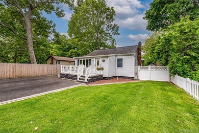 Welcome to 122 Church Drive in the heart of Mastic Beach, a - photo 3