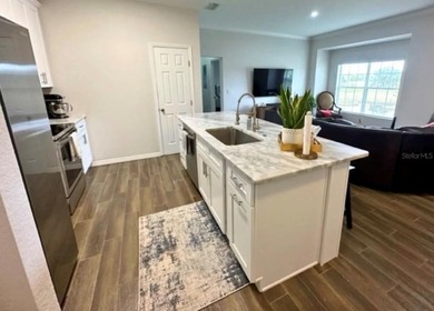 Beautiful completely updated condo in the highly desirable gated - photo 3