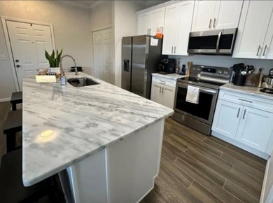 Beautiful completely updated condo in the highly desirable gated - photo 4