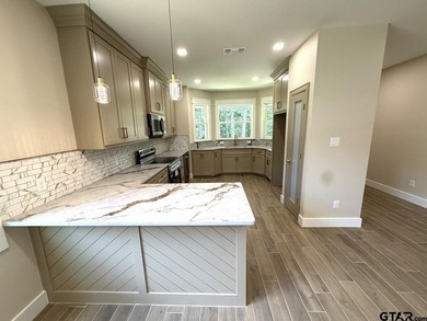 BRAND NEW BUILDER CUSTOM LOCATED ON PEACEFUL PRIVATE STREET WITH - photo 5