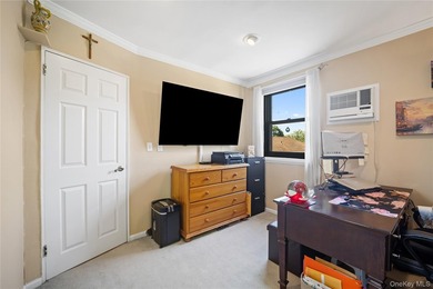 This desirable upper-level 2-bedroom cooperative in the - photo 12