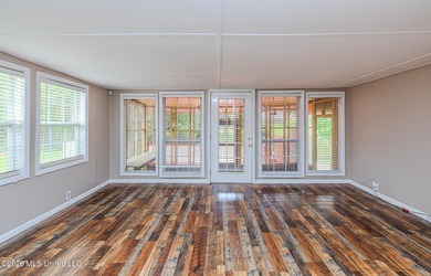 Experience peaceful lakefront living in this beautifully - photo 15