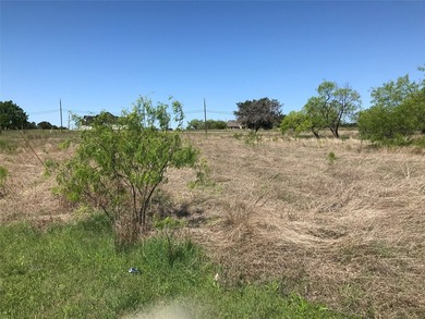 Lot located in 24-7 gated community located north on one of the - photo 2