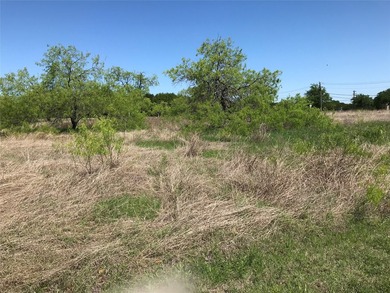 Lot located in 24-7 gated community located north on one of the - photo 3