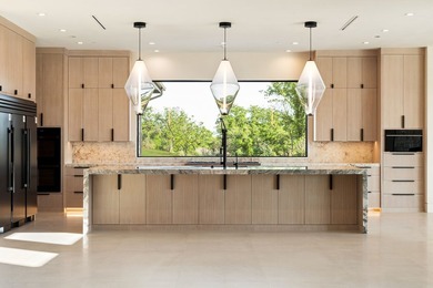 Rising above the forest canopy on nearly 9 secluded acres - photo 14