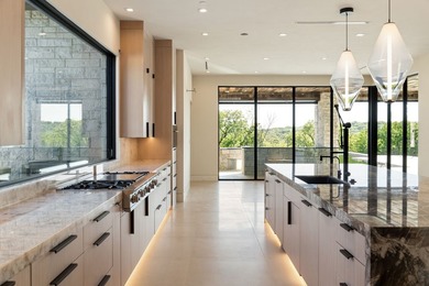 Rising above the forest canopy on nearly 9 secluded acres - photo 17