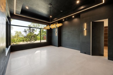 Rising above the forest canopy on nearly 9 secluded acres - photo 22