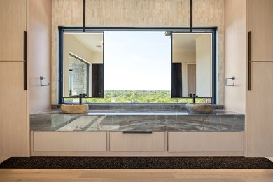 Rising above the forest canopy on nearly 9 secluded acres - photo 33