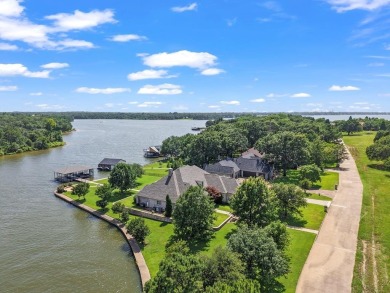Experience luxury lakefront living in this stunning custom home - Lake Home For Sale in Malakoff, Texas