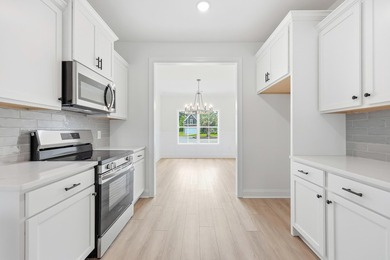 Located in the Shaftesbury Glen community with golf course views - photo 11