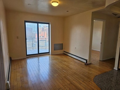 Very Sunny & Lovely 6th Floor Condo features LR, KIT, 2 Bedrooms