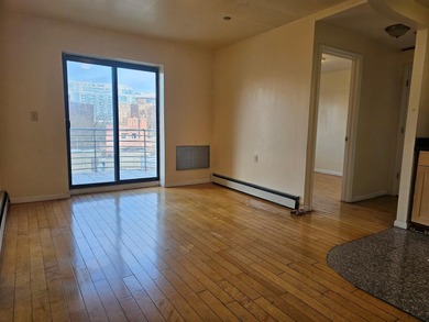 Very Sunny & Lovely 6th Floor Condo features LR, KIT, 2 Bedrooms