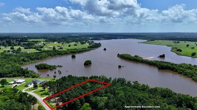 Experience lakeside living in the exclusive, gated community of - photo 2