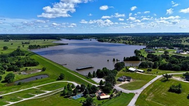 Experience lakeside living in the exclusive, gated community of - photo 10