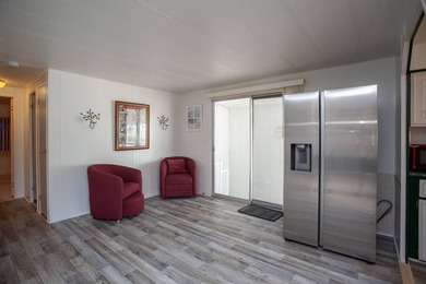 This 2 bedroom 2 bath home has had many upgrades. New flooring - photo 5