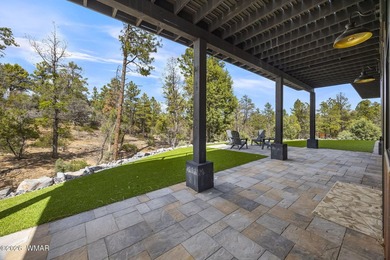 Tucked into the towering pines backing the #7 fairway of the - photo 50