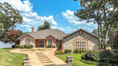 Welcome to an amazing waterfront home located in a gated - Lake Home For Sale in Pittsburg, Texas