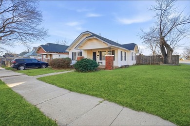 CHARMING 1940s HOME ON A LARGE CORNER LOT. Step into timeless