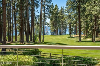 Nestled within the gated, lakefront Glenbrook community on the - photo 1