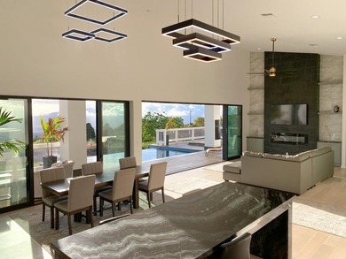A newly completed 2023 Custom home in the prestigious Kula Io - photo 9