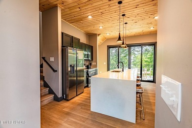 Welcome to one of the most unique and sought-after cabins in the - photo 11