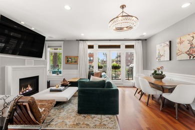 This bright and expansive duplex condominium lives like a - photo 3