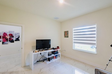Now $519,900 + $10,000 seller credit! This 2024-built 4-bedroom - photo 9