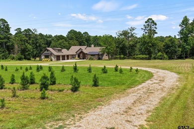 Tucked away behind a winding drive, this custom-built 2023 - photo 1