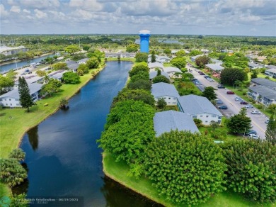 Lake Condo For Sale in Deerfield Beach, Florida