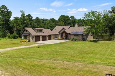 Tucked away behind a winding drive, this custom-built 2023 - photo 2