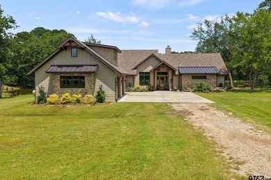 Tucked away behind a winding drive, this custom-built 2023 - photo 3