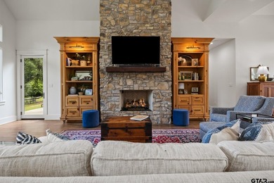 Tucked away behind a winding drive, this custom-built 2023 - photo 6