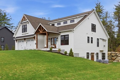 Welcome to a showpiece in Rindge-an almost-new custom farmhouse - photo 2