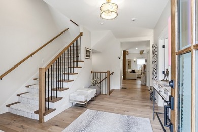 Welcome to a showpiece in Rindge-an almost-new custom farmhouse - photo 3