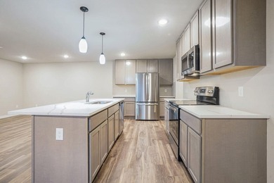 The home includes four well-sized bedrooms, offering flexibility - photo 8