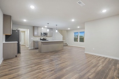 The home includes four well-sized bedrooms, offering flexibility - photo 9