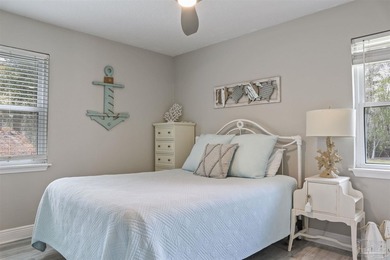 Set along 99 feet of watererfront, this updated brick home - photo 21
