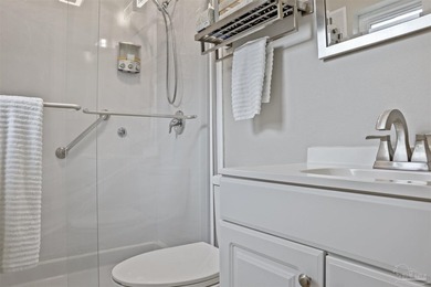 Set along 99 feet of watererfront, this updated brick home - photo 25
