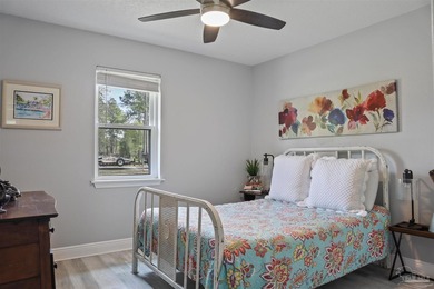 Set along 99 feet of watererfront, this updated brick home - photo 29