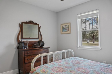 Set along 99 feet of watererfront, this updated brick home - photo 31