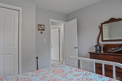 Set along 99 feet of watererfront, this updated brick home - photo 32