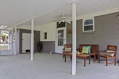 Set along 99 feet of watererfront, this updated brick home - photo 34