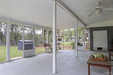 Set along 99 feet of watererfront, this updated brick home - photo 35
