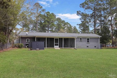 Set along 99 feet of watererfront, this updated brick home - photo 38