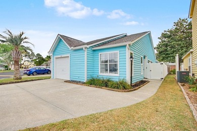 Experience coastal living in a beautifully updated home located - photo 1