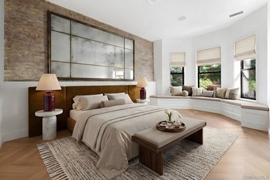 A fully renovated two-family townhouse spanning approximately 3 - photo 8